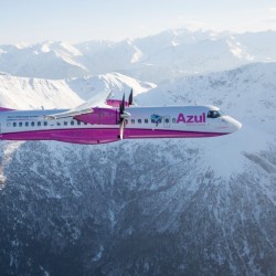 The pink liveried ATR 72-600 (PR-AZV) over the mountains