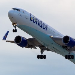 The blue-bellied aircraft lifts off from Seattle.