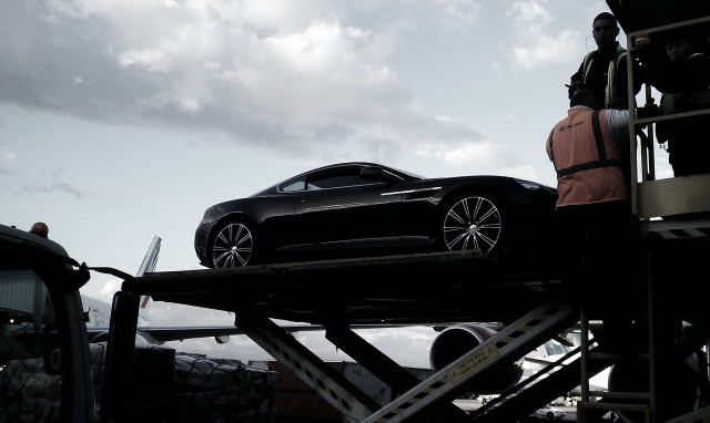 A Maserati gets loaded on to an airplane. Photo by Brandi Bell.