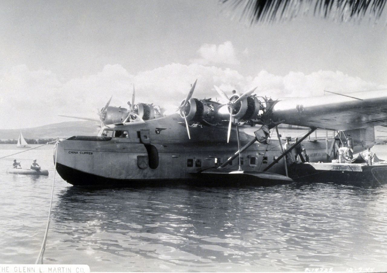 Martin MB-130 Flying Boat, the original "China Clipper" tied up to a 