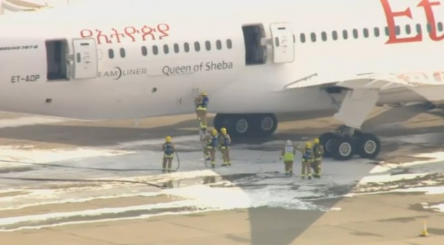 Fire crews inspect the Eithiopian Boeing 787 Dreamliner. Screen shot via Sky.com