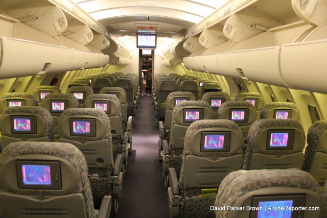 Riding On The Upper Deck Of An Eva Air Boeing 747 In