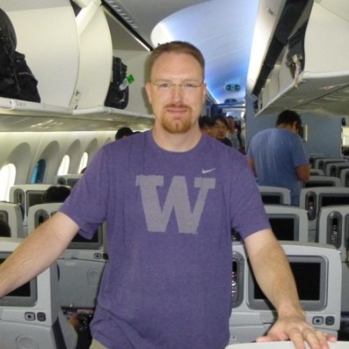 Blaine standing on a Boeing 787 Dreamliner for ANA.