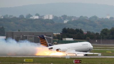 contact_f100_d-afke_stuttgart_090914_3 A lot of sparks from the ContactAir Fokker 100 landing without landing gear