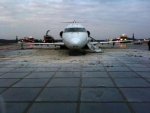 CRJ200 after hitting the concrete barriers