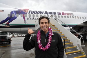 Apolo Ohno outside of his special livery plane. "Follow Apolo to Hawaii"