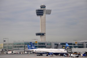 John F. Kennedy International Airport's control tower with a few jetBlue Airbus A320's in front