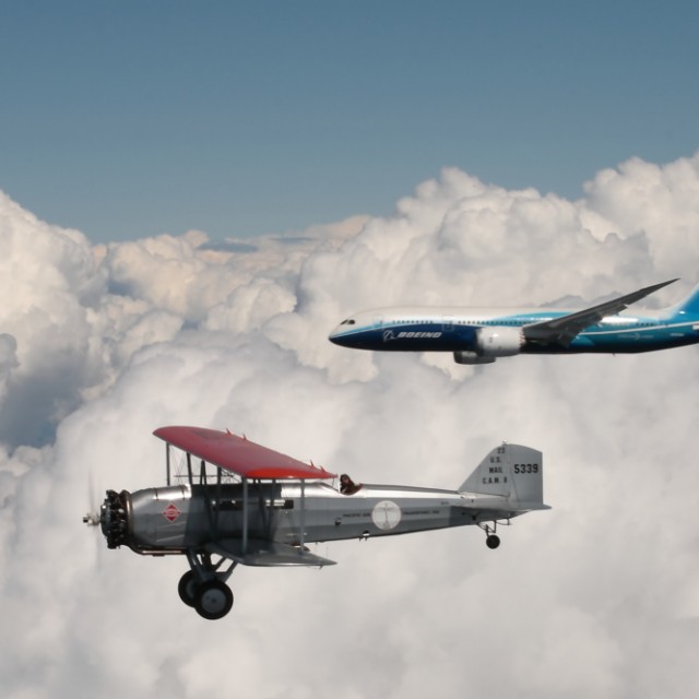 Boeing 787 Dreamliner and Boeing 40C flying together