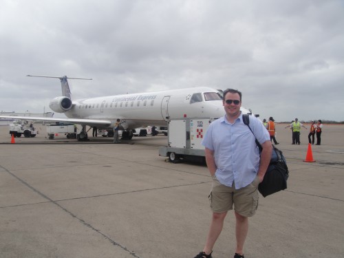 Me in front of the first ERJ-145 I flew at Mazatlan Airport. I love being able to get close to the plane on the tarmac.