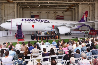 Hawiian Airlines brand new Airbus A330 next to their first plane, a 1929 Bellanca CH-300 Pacemaker