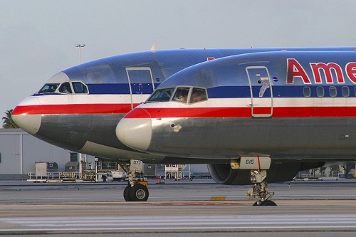 An American Airlines Boeing 757 and Airbus A300 line up for take off at Miami International Airport