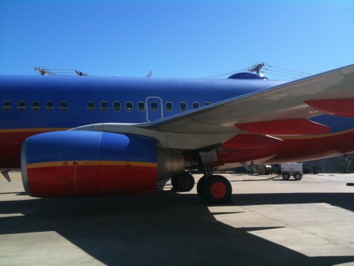 Southwest Boeing 737-700 (N495WN) that is just hanging out on the ground providing Wi-Fi. That bump tells you it has internet.