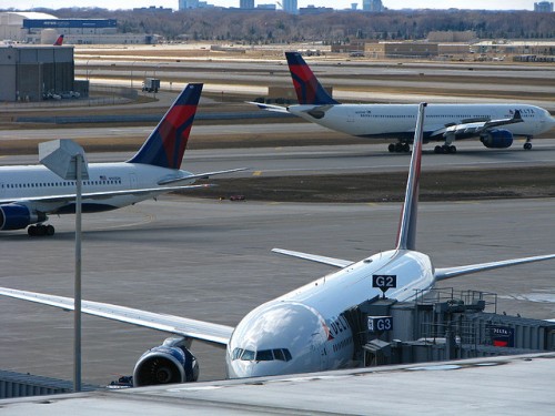 Quick! What are the three different aircraft types in this photo?