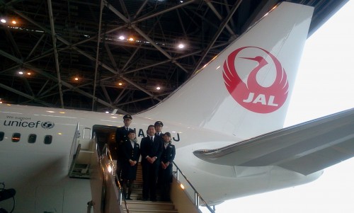 Cabin crew check out the new Boeing 767 with crane livery.