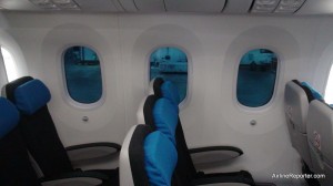 Passengers are able to tint the windows using the button below them. This is a middle level tint.