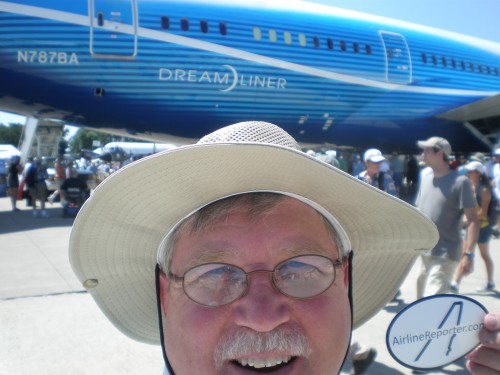 Dave Sconzert at AirVenture 2011 (Oshkosh) in front of the first 787 Dreamliner (ZA001) with a sticker.