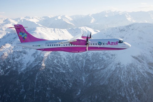 The pink liveried ATR 72-600 (PR-AZV) over the mountains