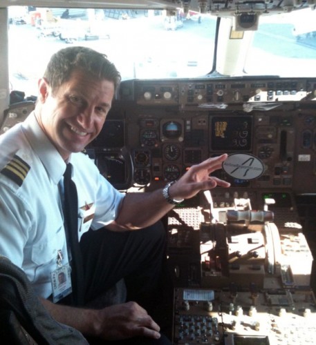 Delta Air Lines Boeing 757-200 captain poses with a sticker. Taken by Russell Christensen (@von_christensen).