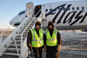 Alaska customer service agents Heidi Tokar (left) and Julie Bilbey (right), of Bethel, are dressed in a typical winter-weather gear for this remote area of Alaska.