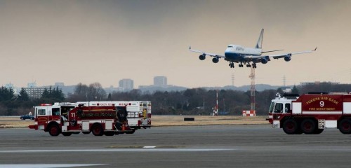 A United Airlines Boeing 747-400 lands.