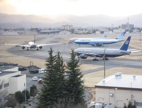 Two United and one American aircraft find parking.