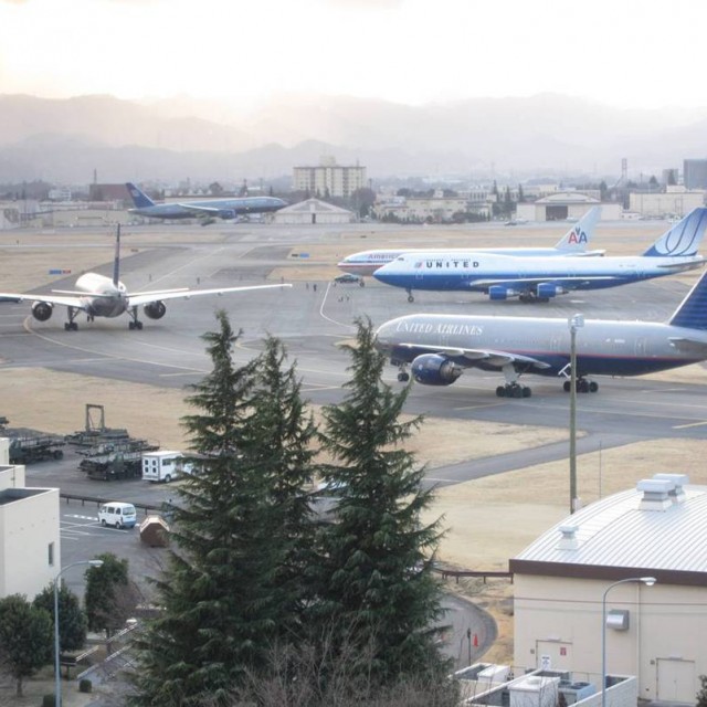 Two United and one American aircraft find parking.