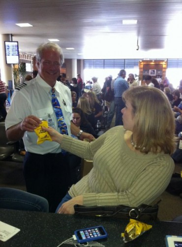 Southwest Airlines flight got delayed today and captain came out to give peanuts. Now that is some LUV! Click for larger.
