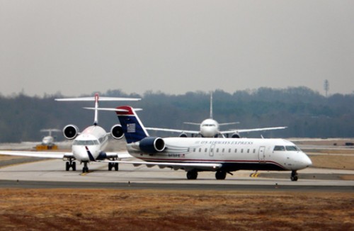 US Airways Express (PSA) CRJ 200 on the taxiway followed by ”Company Traffic" CRJ 700