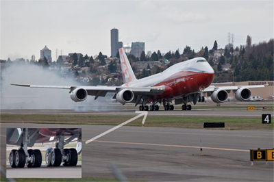Boeing 747-8 Intercontinental has tire blow today. Photo by Jeremy Dwyer-Lindgren. Click for more photos.