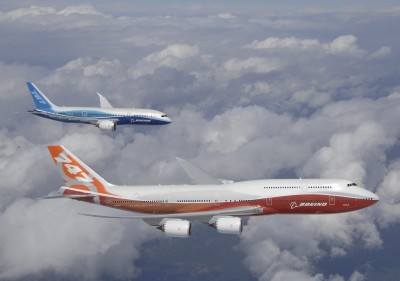 The Boeing 787 Dreamliner (ZA001) and Boeing 747-8 Intercontinental (RC020) flying side-by-side. Photo by Boeing. Click for much larger.
