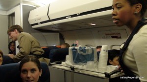 Game time! Newbie flight attendants try out their new skills in the mock Boeing 717.