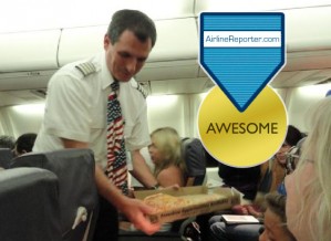 Southwest Airline's pilot hands out pizza. Awesome!