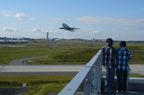 Harry and his brother Charlie watch as a Boeing Dreamlifter takes off from Paine Field