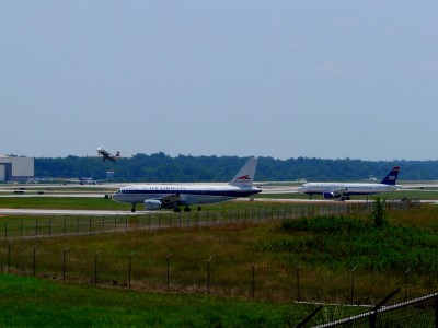 P1190570 Four US Airways aircraft in three different liveries. Closes is special Allegheny livery (N745VJ)