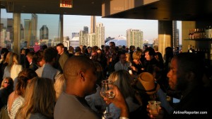 Bunch of people having a good time on the roof of the Thompson Toronto Hotel