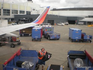 Southwest wingtip at Seattle. I am cheating, this is an older photo, but there are no Southwest planes at gates right now at SEA.