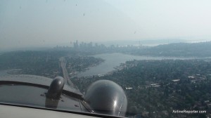 Kenmore Air de Havilland Canada Beaver seaplane (N6781L) coming in for landing on Lake Union right by Seattle. That darn Canadian fire-haze!