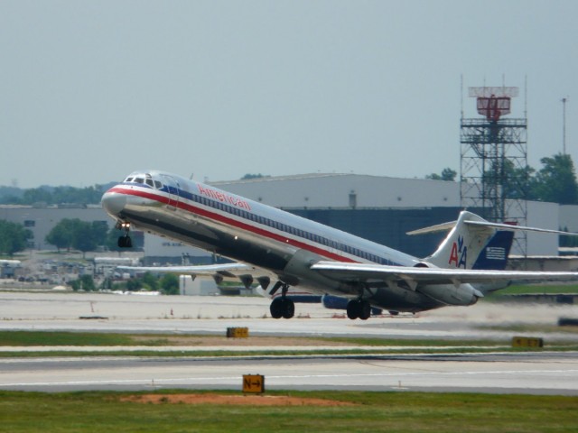 An American Airlines MD-83 (Super 80) lifts off of Runway 36C at Charlotte-Douglas International Airport.
