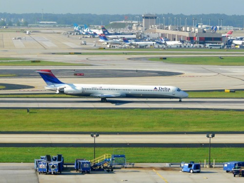 Look Ma! No Rabies! A Delta Air lines MD-88 slows after landing at Atlanta"s Hartsfield International Airport