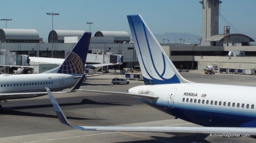 United Airlines Boeing 757 and Continental Airlines Boeing 737 get close at LAX. Two airlines will (most likely) become one soon!
