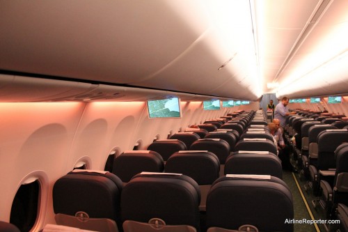 After take off the lights went to an orangy color while food was served. This photo gives an idea of how empty the 737 was.