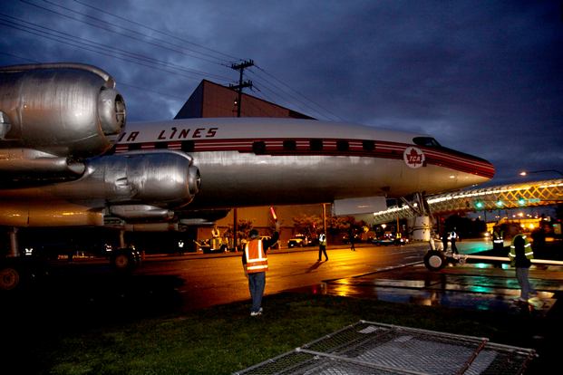 The Seattle Museum of Flight's Lockheed 1049G Super Constellation is towed across East Marginal Way South from Boeing Field into the museum's Airpark. (Ted Huetter/Museum of Flight)