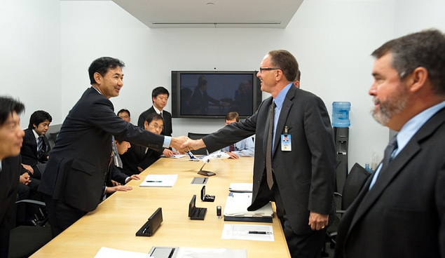 Takeo Kukuchi (left), All Nippon Airways' general manager for its Seattle office, shakes hands with Paul Baldwin, Boeing's Aircraft Contracts, after signing the final paperwork for contractual delivery of the first-ever 787 Dreamliner. Photo From Boeing.