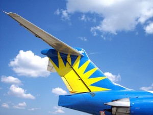 Allegiant MD-80 tail with a clear blue sky