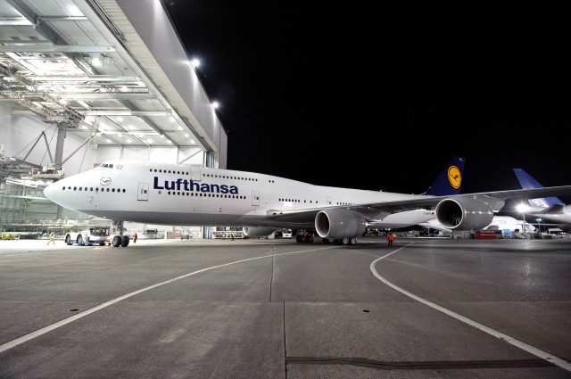 Lufthansa 747-8I paint hangar roll out K65426- A full liveried 747-8I rolls out of the paint hangar overnight.
