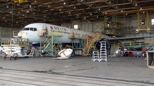 A Boeing 757 with its nose off in for work at Delta Tech Ops.