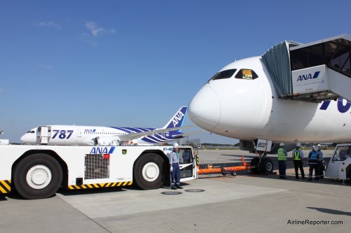 ANA's first 787 Dreamliner (JA801A) sits in the background at their second (JA802A) waits to take us for a ride.