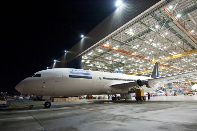 United's first Boeing 787 Dreamliner is pulled out of the factory. Image from Boeing. Click for Larger.