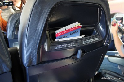 Allegiant's new seats have the seat pocket located on the top of the seat.