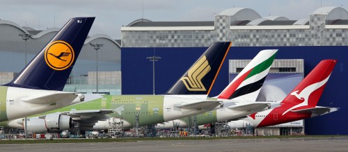 Lufthansa, Singapore Air, Emirates and Qantas Airbus A380s sit in Toulouse